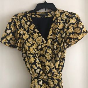 Navy blue and yellow floral wrap dress